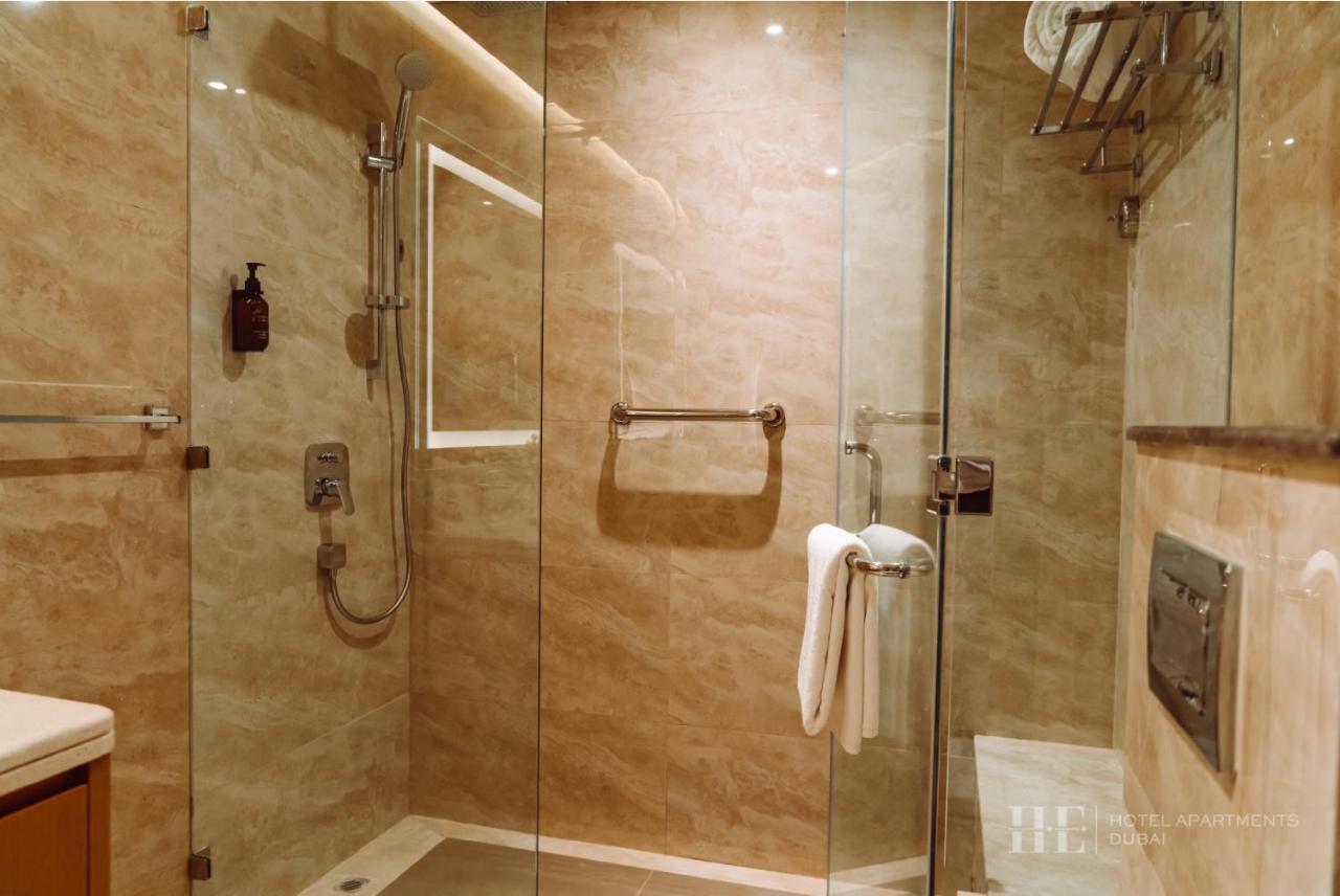 He Hotel Apartments Дубай Номер фото A shower cubicle